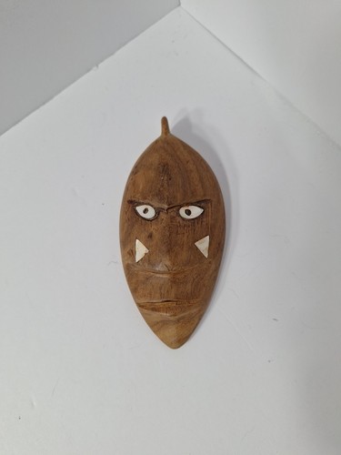 Carved wooden tribal face - face, mask